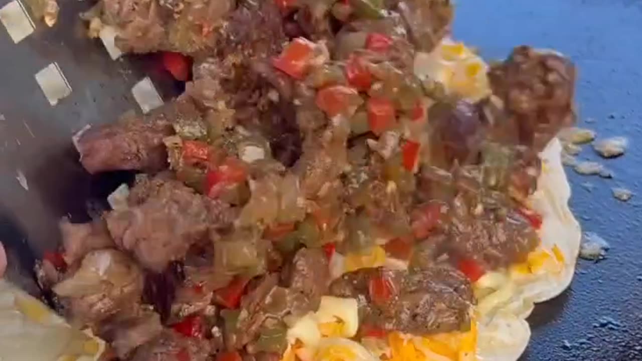 Juicy beef mixed with cheese in a torrtilla bread