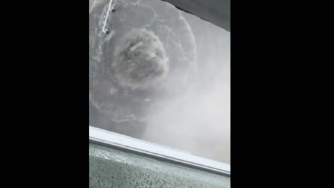 WATCH: Storm drain erupts into geyser during flash flooding in St. Louis,