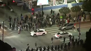 Protesters outside LA hotel after reports of ICE agents staying