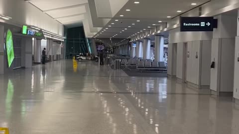 Buffalo Airport Cart Driven Through Moving Sidewalks