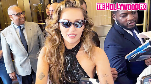 Miley Cyrus & Her Boyfriend Maxx Morando Are Mobbed By Fans While Leaving Her Hotel In New York, NY