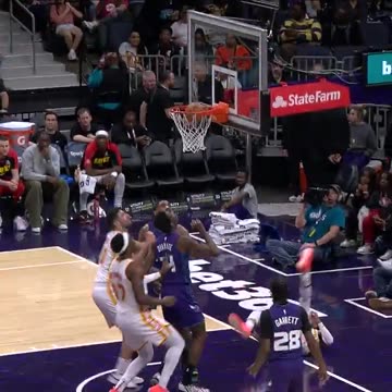 NBA - Trae gets it to go with the left while hitting the floor!