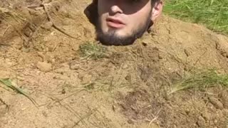 Russian Soldier Who Refused to Advance is Buried Up to His Neck Like it's 1720