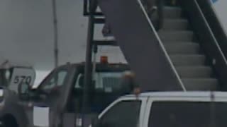 Several handcuffed people loaded onto a plane by DHS in Minnesota