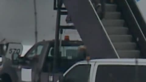 Several handcuffed people loaded onto a plane by DHS in Minnesota