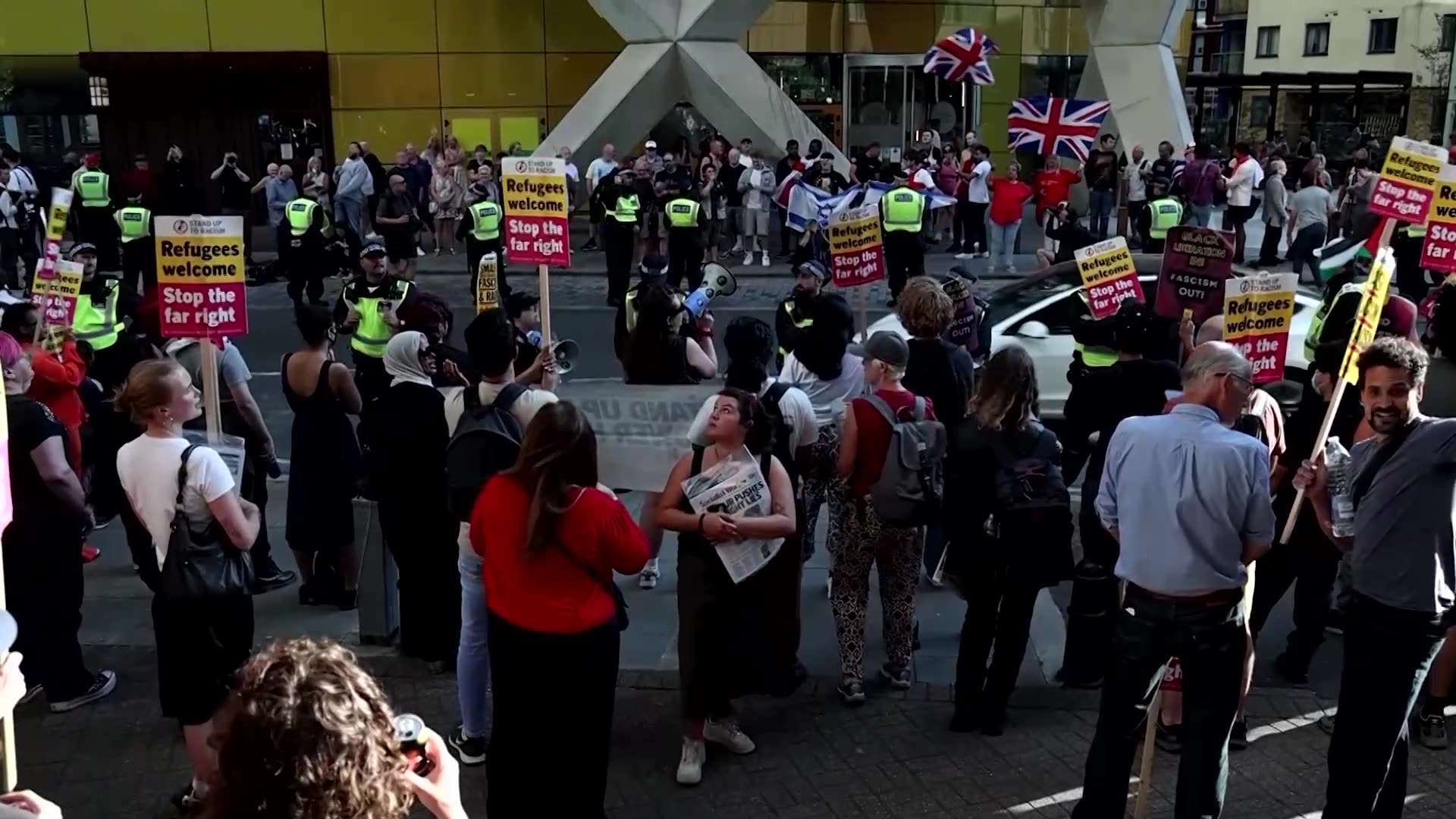 Anti-immigration and anti-racism protesters face off in London
