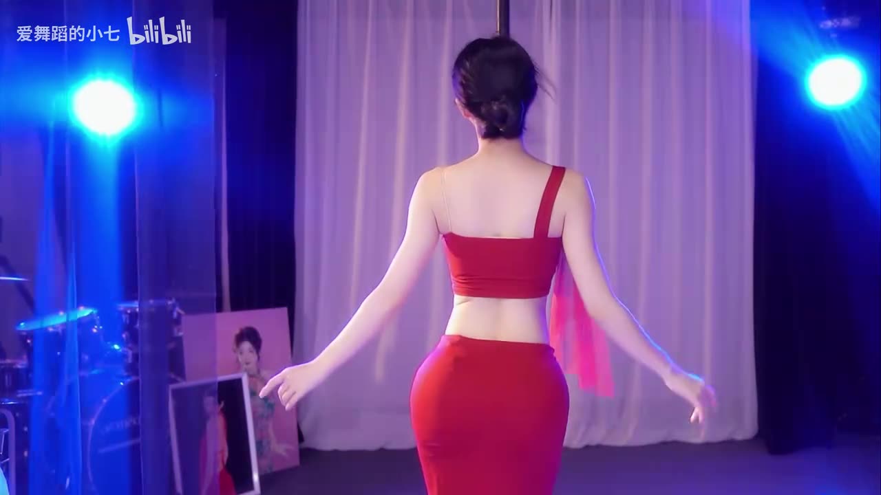 Fiery Pole Dance in a Red Dress