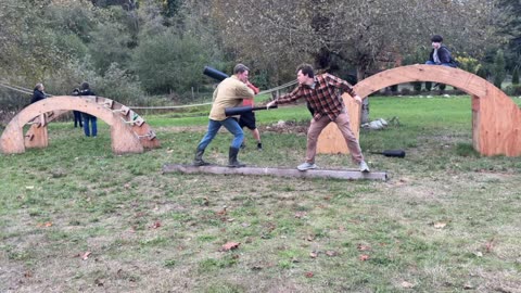 Andrew and Ben battling on the beam