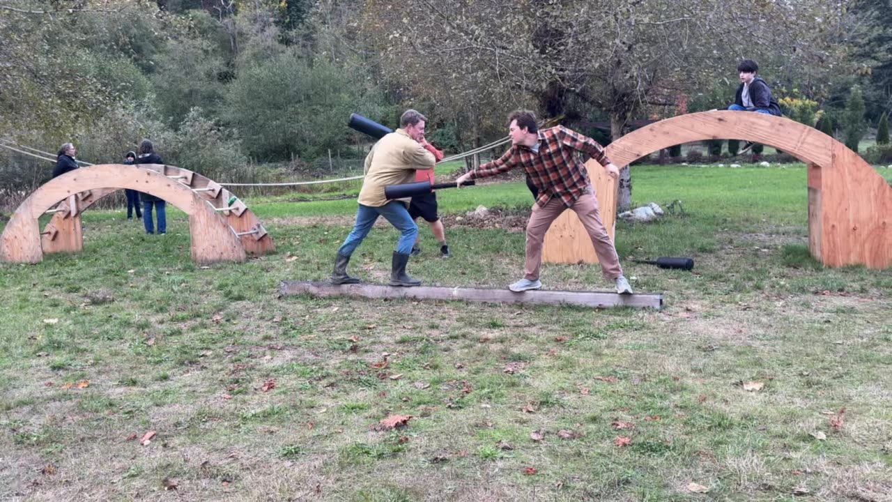 Andrew and Ben battling on the beam