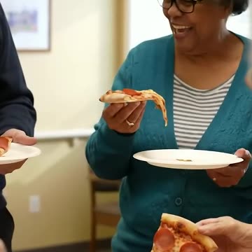 adults happily eating in a nursing home