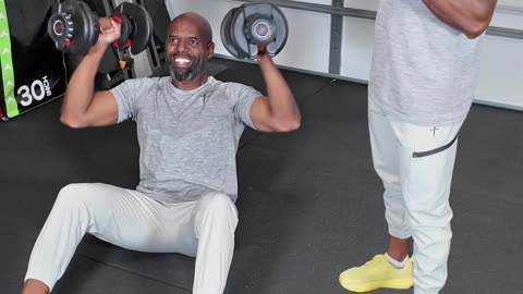DUMBBELL SIT UP TO OVERHEAD PRESS