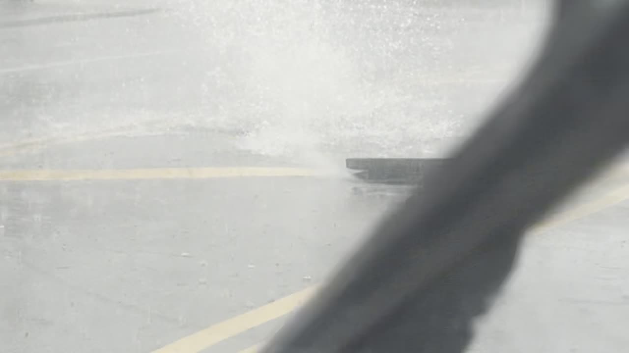 Water Bursts From Chicago Sewer During Heavy Rain