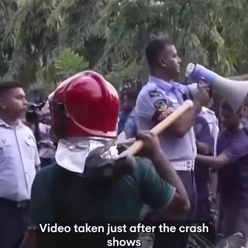 Air force jet crashes into school in Bangladesh - 7NEWS Australia (720p, h264)