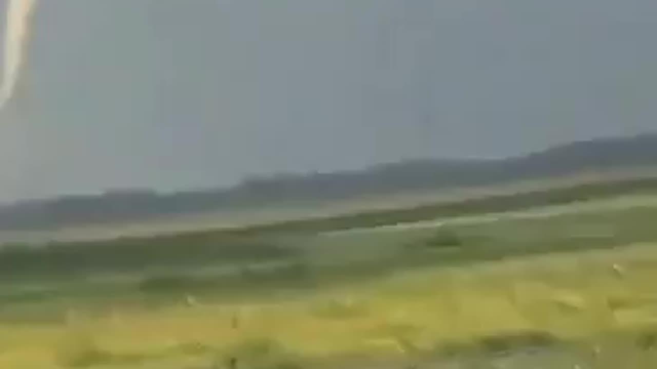 Tiny tornado on the ground in Crystal Lake, Iowa, a short time ago.
