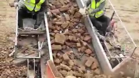 Bar Feeder in Action for Construction Waste!