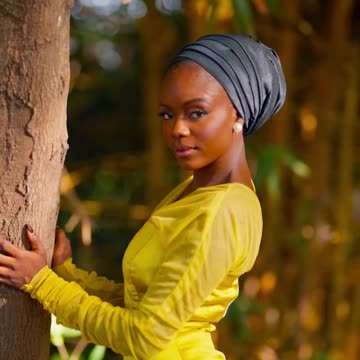Elegant Woman in Yellow Dress Outdoor Portrait