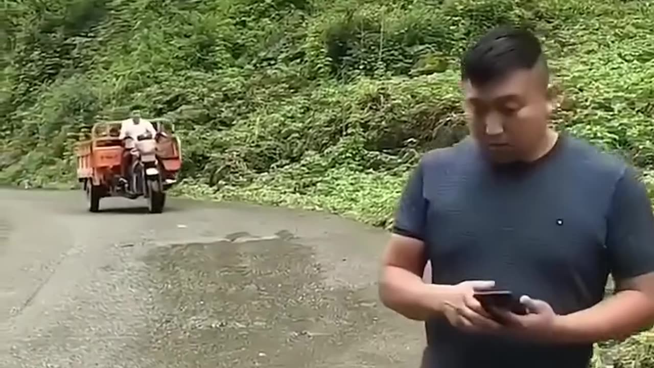 Fixing a pothole and removing rocks from the road!.hd