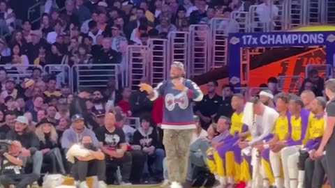 LeBron coaching from the sidelines during Nuggets vs. Lakers.