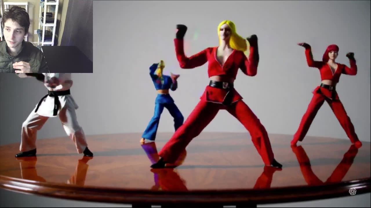 Action Figures Dancing In A Martial Arts Style Dance-Off On A Table Fake Stop Motion Video
