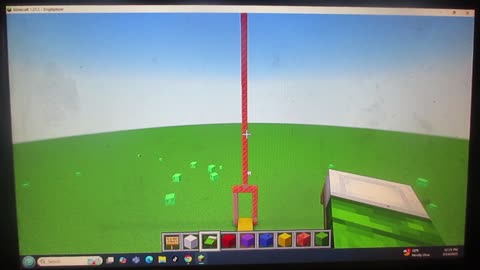 Minecraft: Hobbit Door and Flag of Oz in progress. May 15, 2025.
