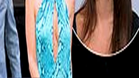Emily Ratajkowski Flashes Cleavage in Racy Peekabo