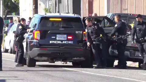 Suspect Jumps Roof To Roof, Crowd Fights with LAPD