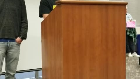 Man pulls pants down at school board meeting.