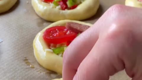 This is how to make a pizza bread. Its a bread texture with pizza topping
