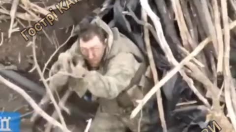 Russian Soldier Takes Aim with a Stick