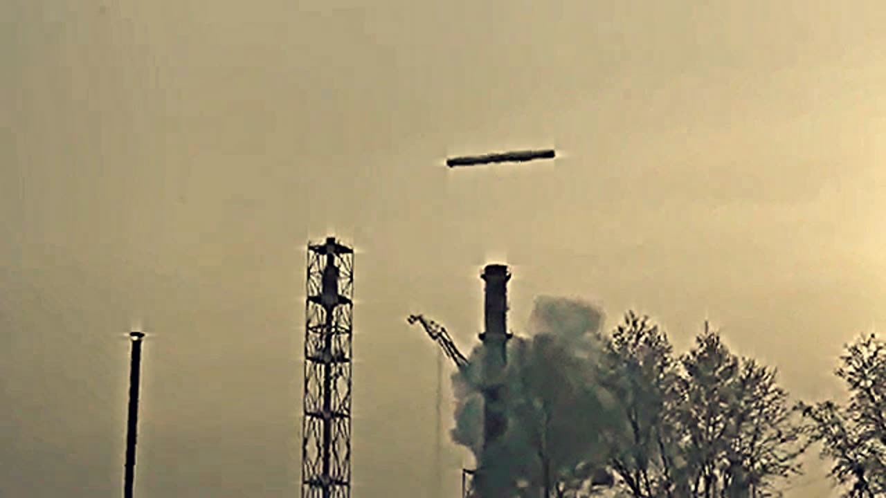 the cigar shaped UFO shows up over Russia ( Alien Space Craft )