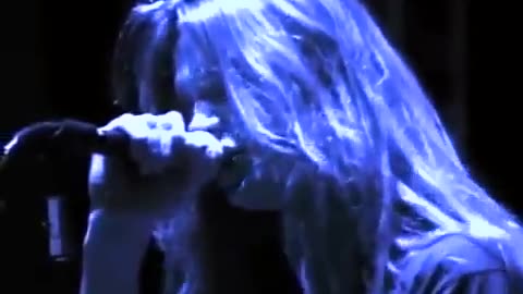 skid row in a darkened room