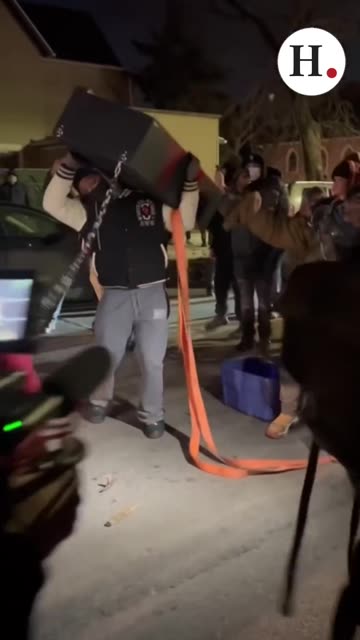 Anti-ICE in Minneapolis attempts to break open a law enforcement's weapon locker