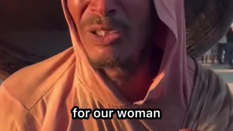 A Palestinian man breaks down as he carries what he can carry away from his home