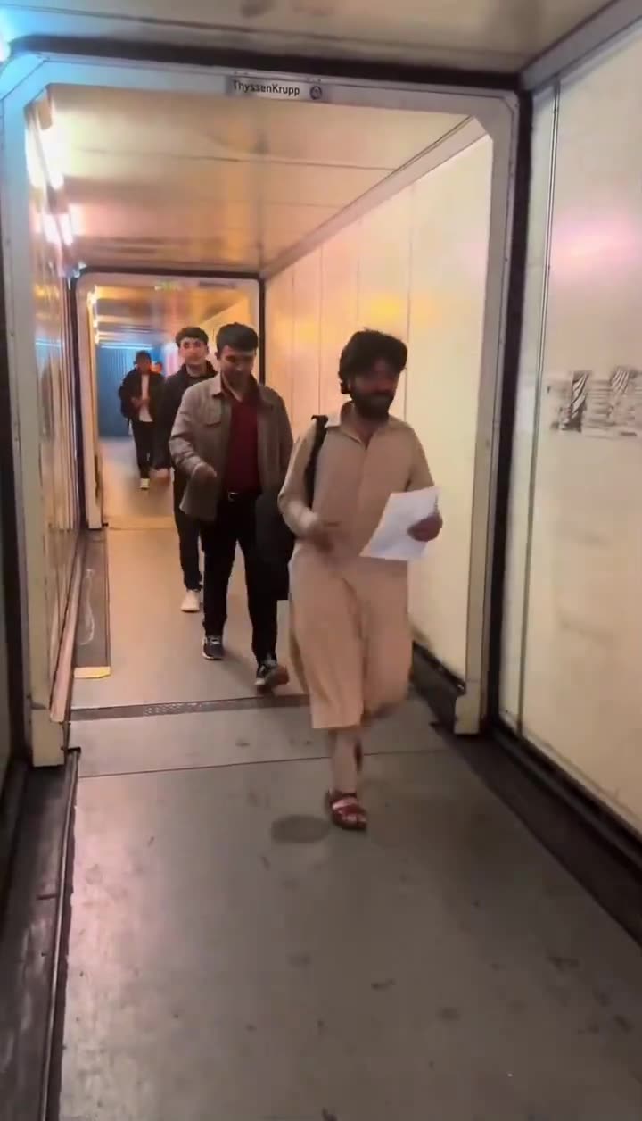 Afghans boarding a flight to the UK under the Afghan resettlement scheme