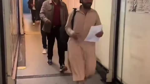 Afghans boarding a flight to the UK under the Afghan resettlement scheme