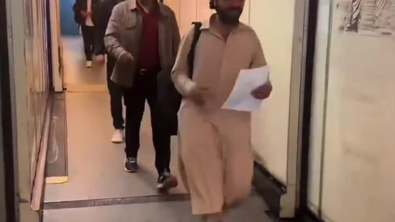 Afghans boarding a flight to the UK under the Afghan resettlement scheme