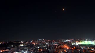 Missiles streak over the West Bank as Israel-Iran air war continues