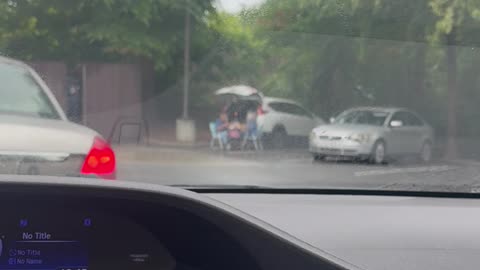Elderly Couple's Parking Lot Picnic