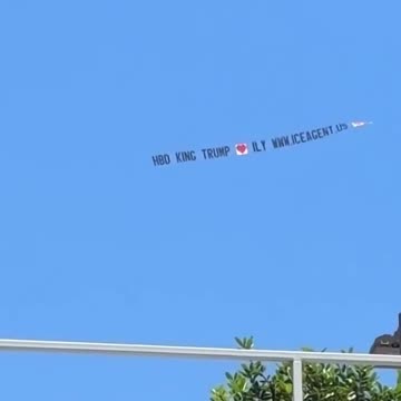 KING TRUMP BANNER OVER NO KINGS PROTESTORS LOL