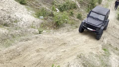Off-Roading Car Overturns on Incline