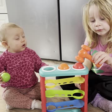 Santa Brought the Perfect Toy for Both Sisters