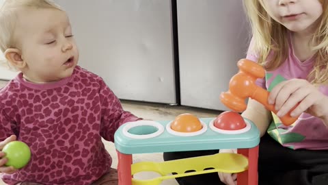 Santa Brought the Perfect Toy for Both Sisters