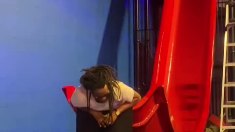 Dad Tries Trampoline Park's Steep Slide