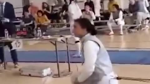 Female fencer refuses to fight a male, gets disqualified!