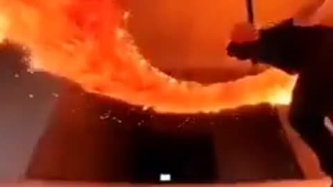 Fiery Creation: Man Designs and Wields an Actual Fire Sword!