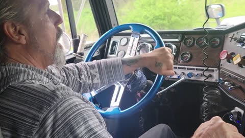 JOY RIDE THROUGH LOCAL FLOODWATER IN THE FREIGHTLINER