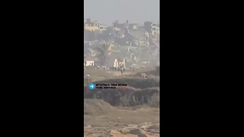 Sniper work - Gaza. Armed terrorist shot in motion.