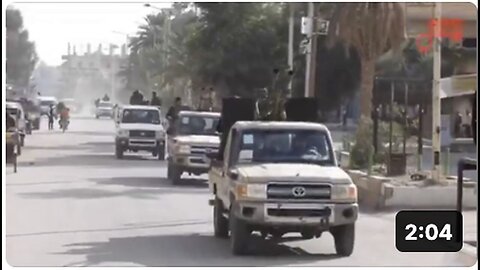 "Iraqi Fighters in Thousands March to Syria for Support"