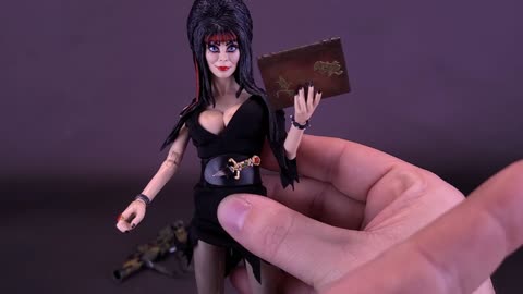 NECA Elvira Mistress Of The Dark Commando Elvira Figure