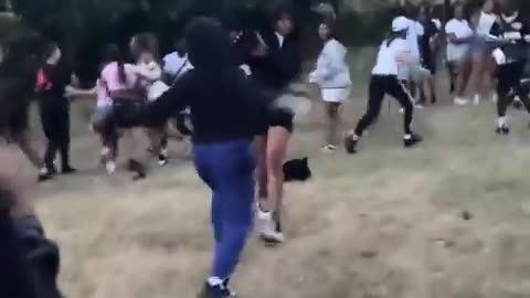 A woman pulls a knife during a party at Gladstone Park.